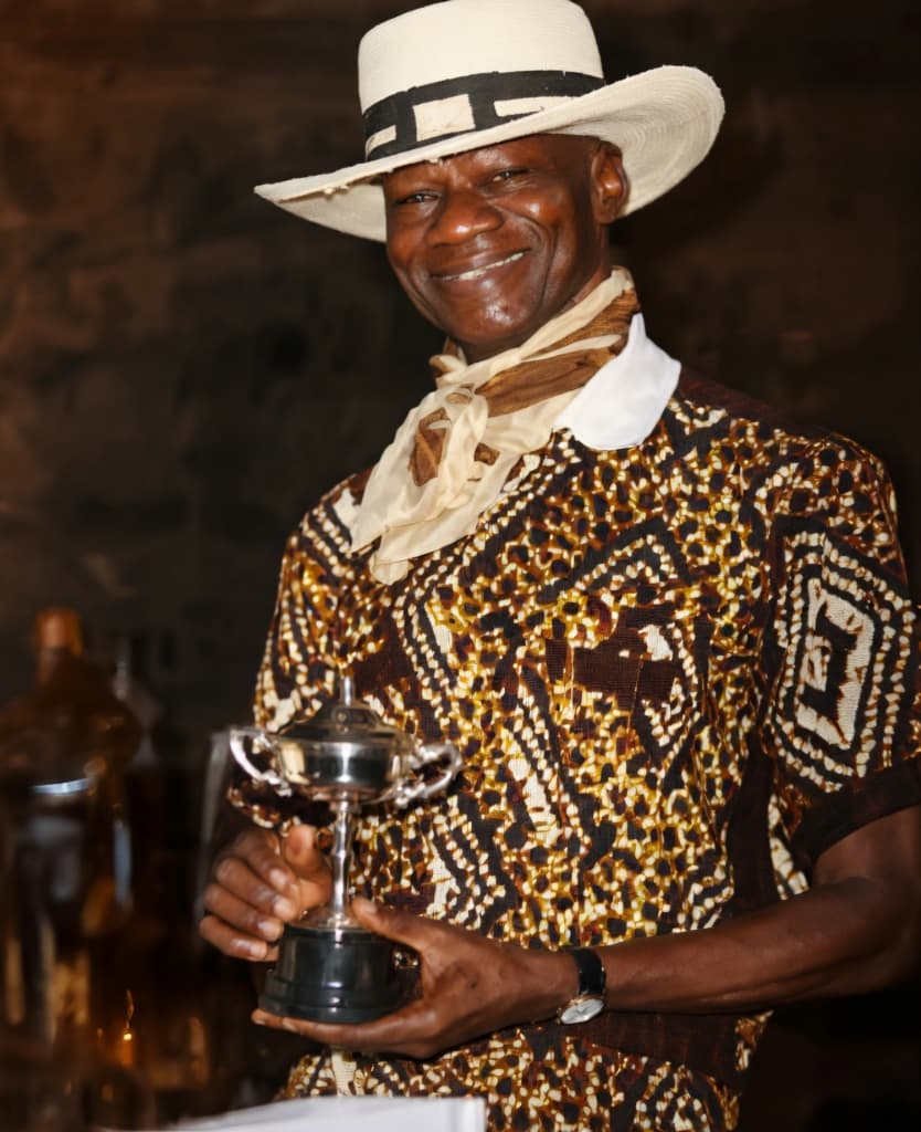 Chief Isaac Fola Alade with his Golf trophy