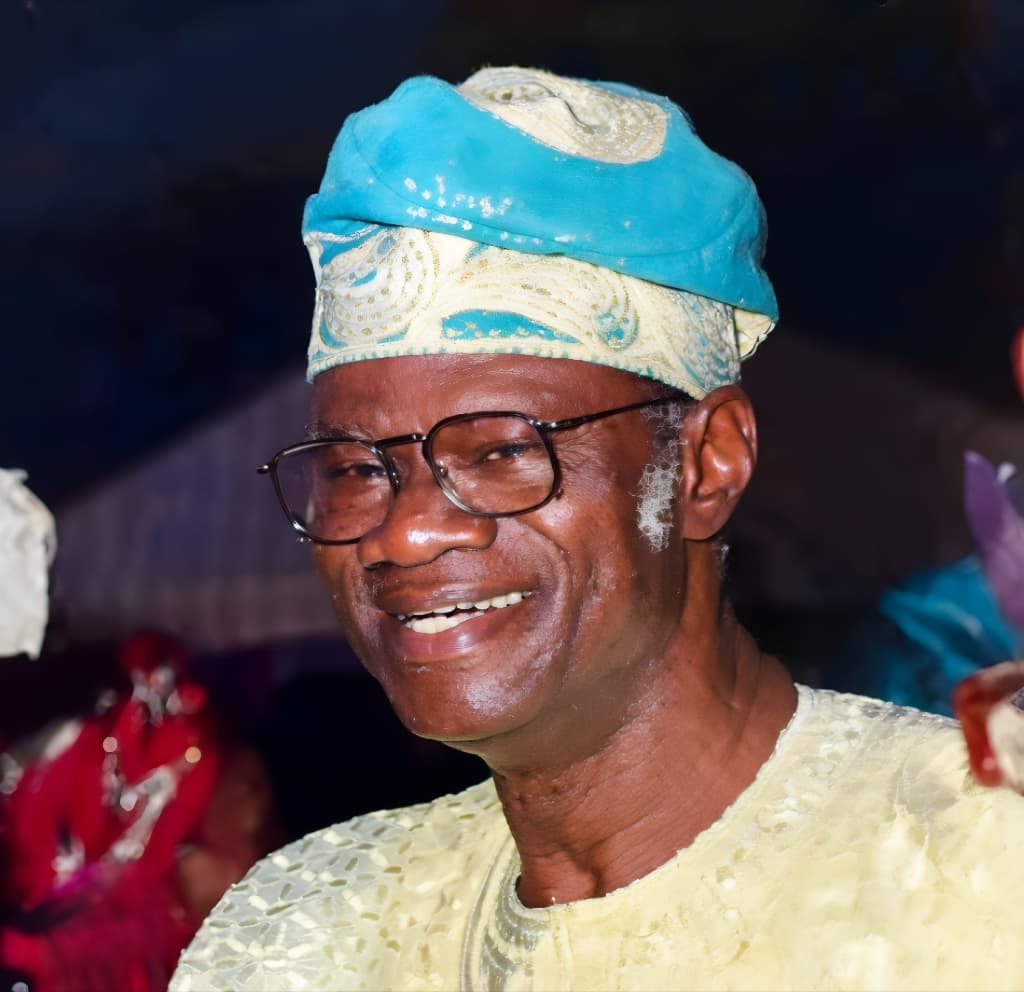 Chief Fola Alade in a blue aso-oke cap