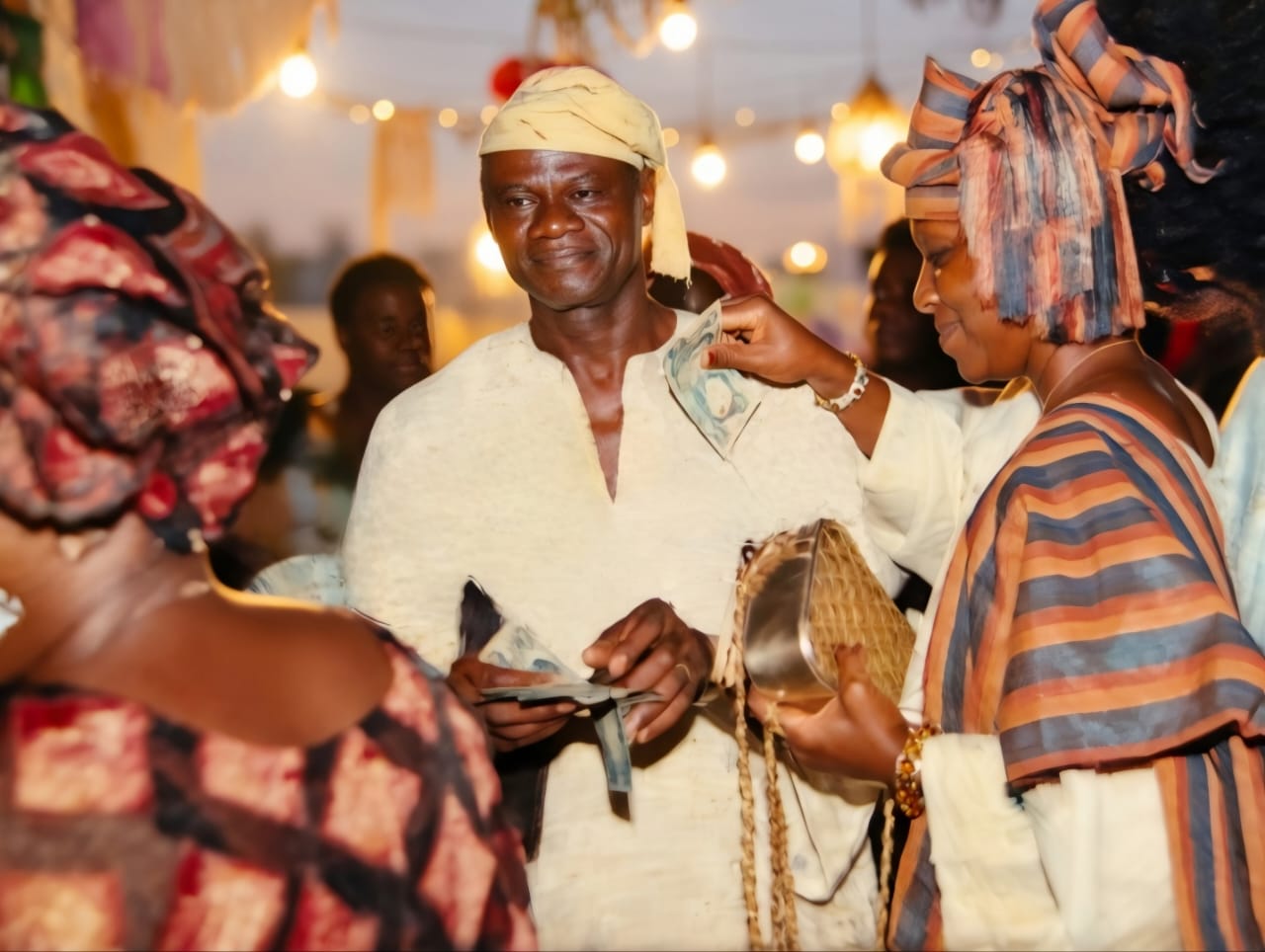 Chief (Arc.) Isaac Fola Alade dancing at the wedding party of his son Oladipo Fola Alade and Osarhieme Fola Alade's wedding.